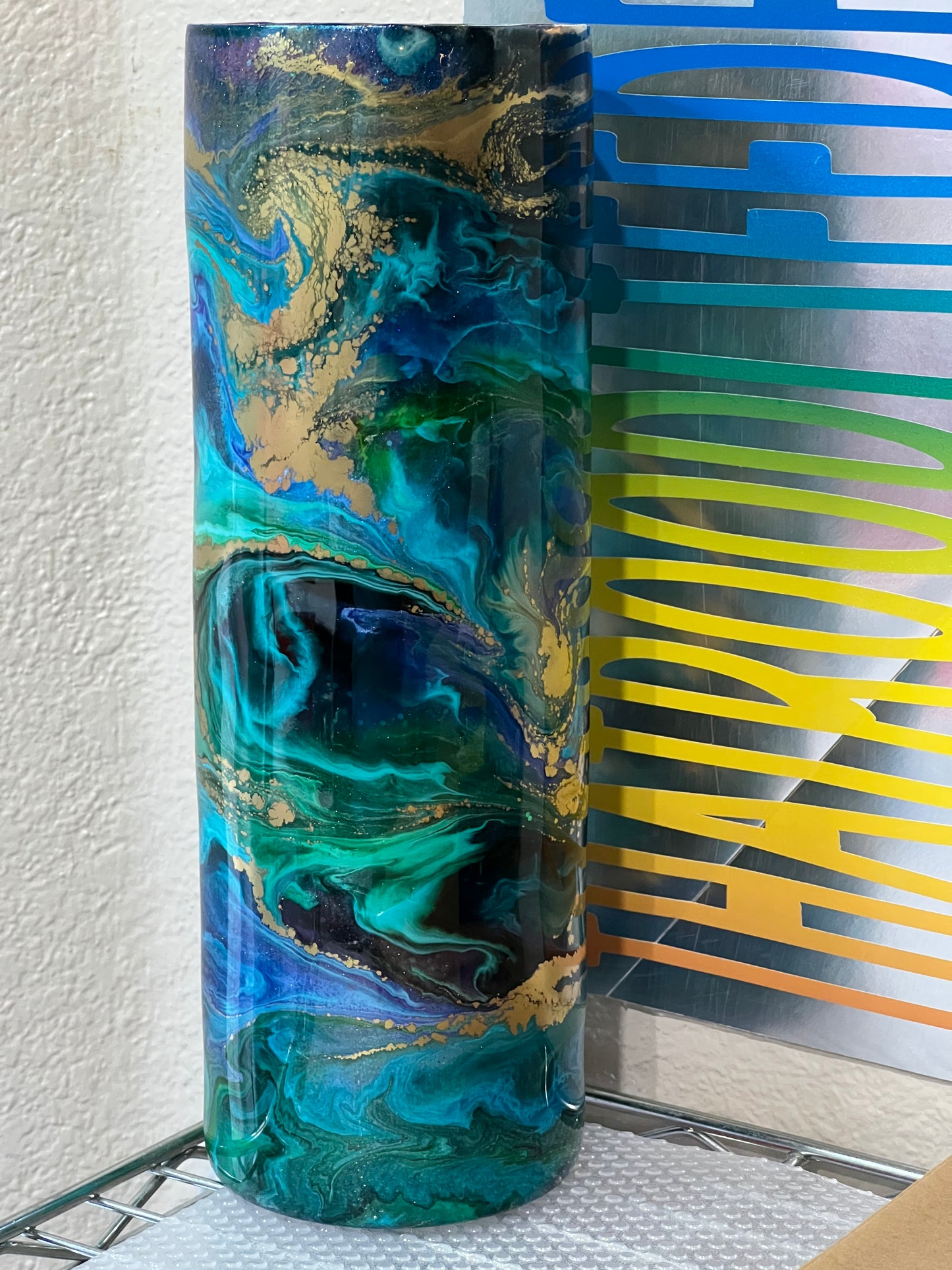 Gold, pink, blue and teal swirl