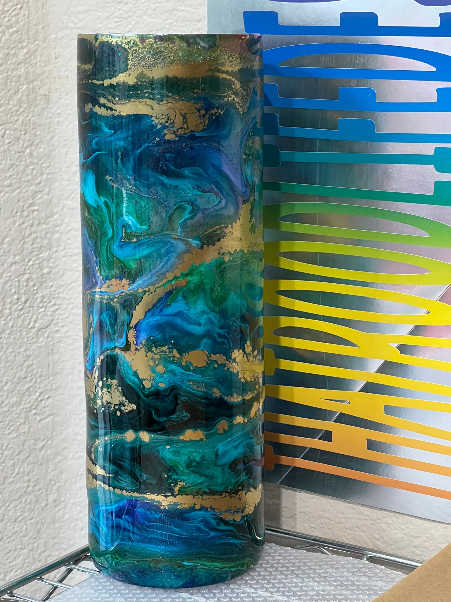 Gold, pink, blue and teal swirl